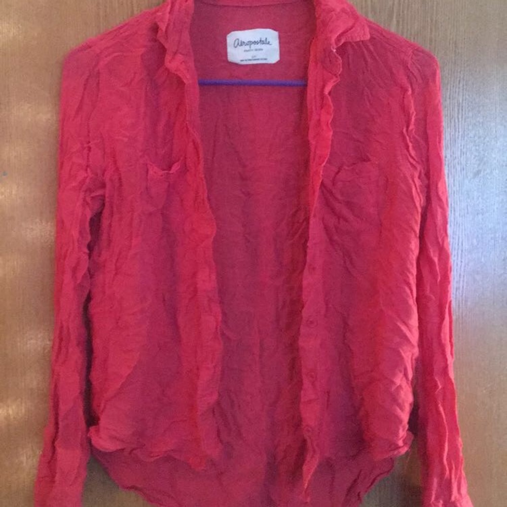 Red button down light shirt